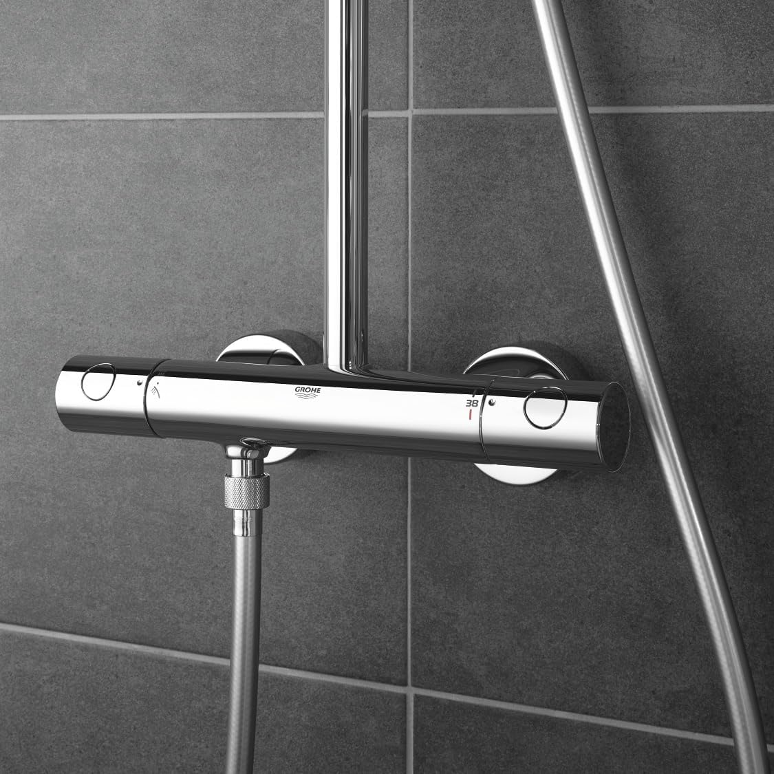 Close-up of the GROHE thermostatic shower mixer with temperature and flow controls