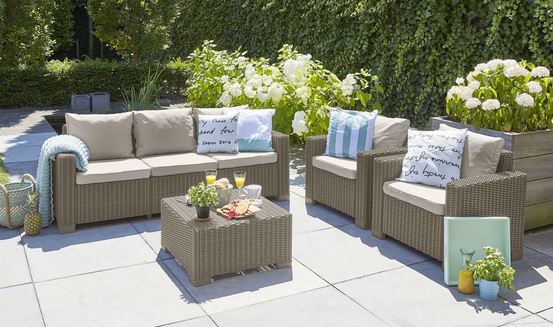 Close-up of the Keter California Garden Sofa's leg and base, showing the braided texture