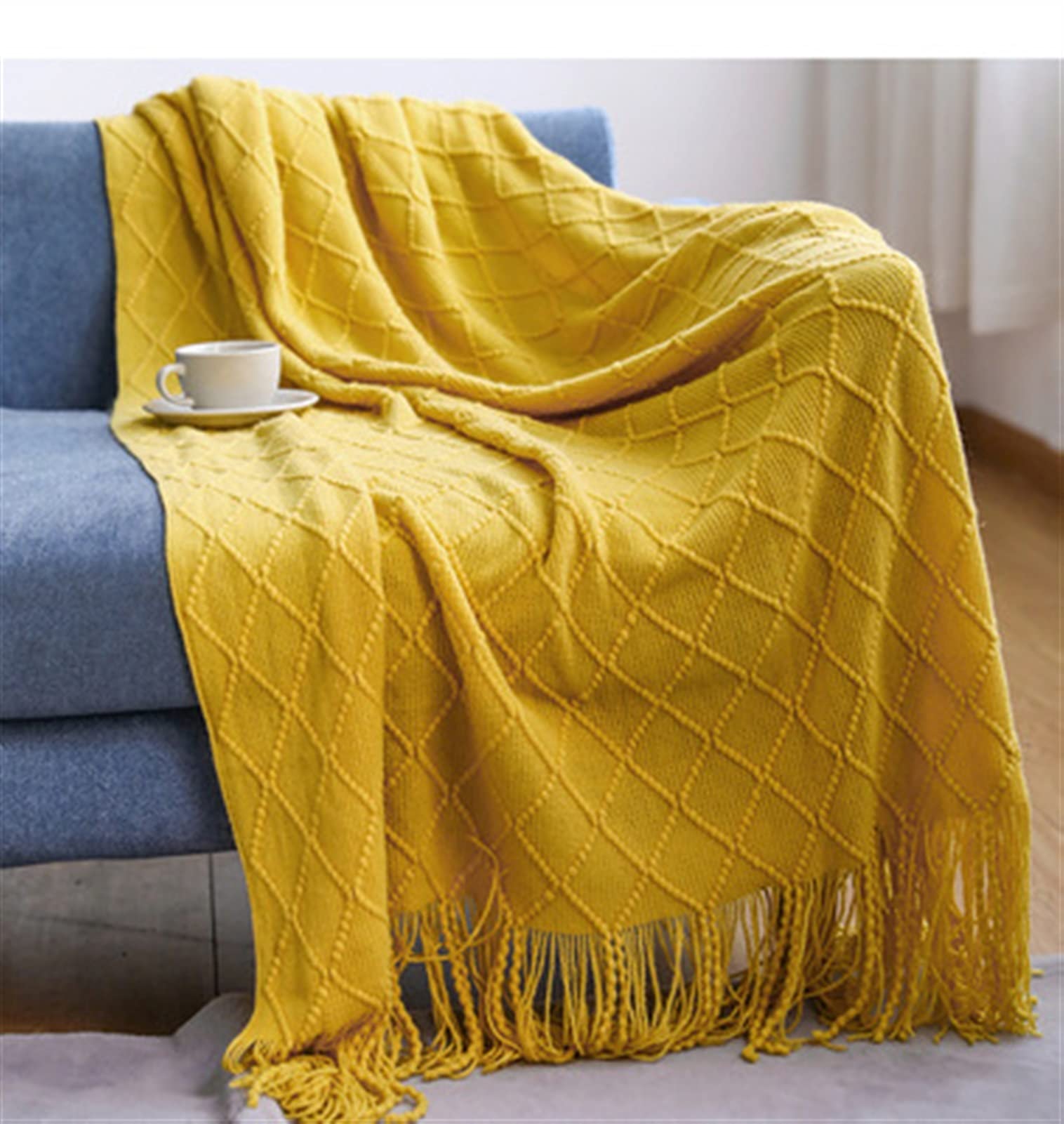 Couverture tricotée bohème pour réchauffer vos soirées cocooning sur le canapé