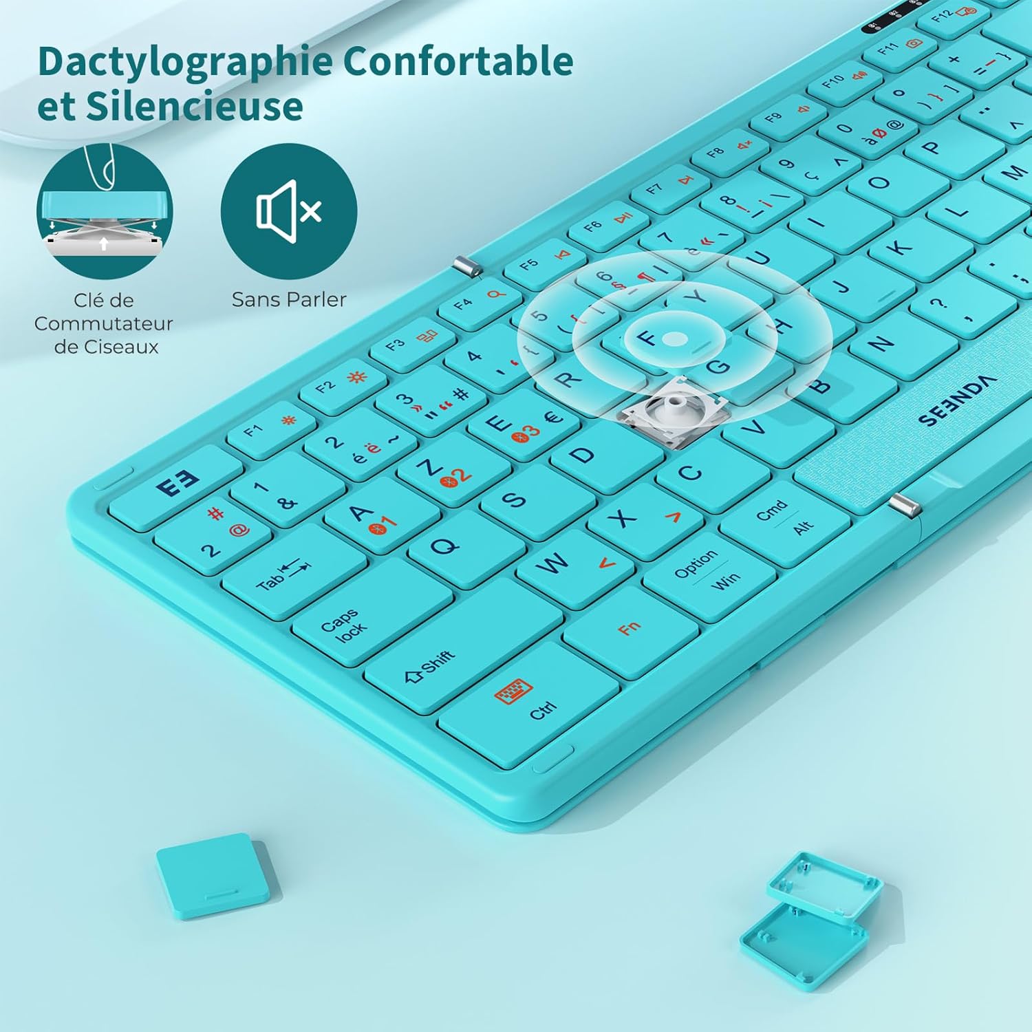 Close-up of a seenda keyboard key showing the scissor-switch mechanism for quiet typing.