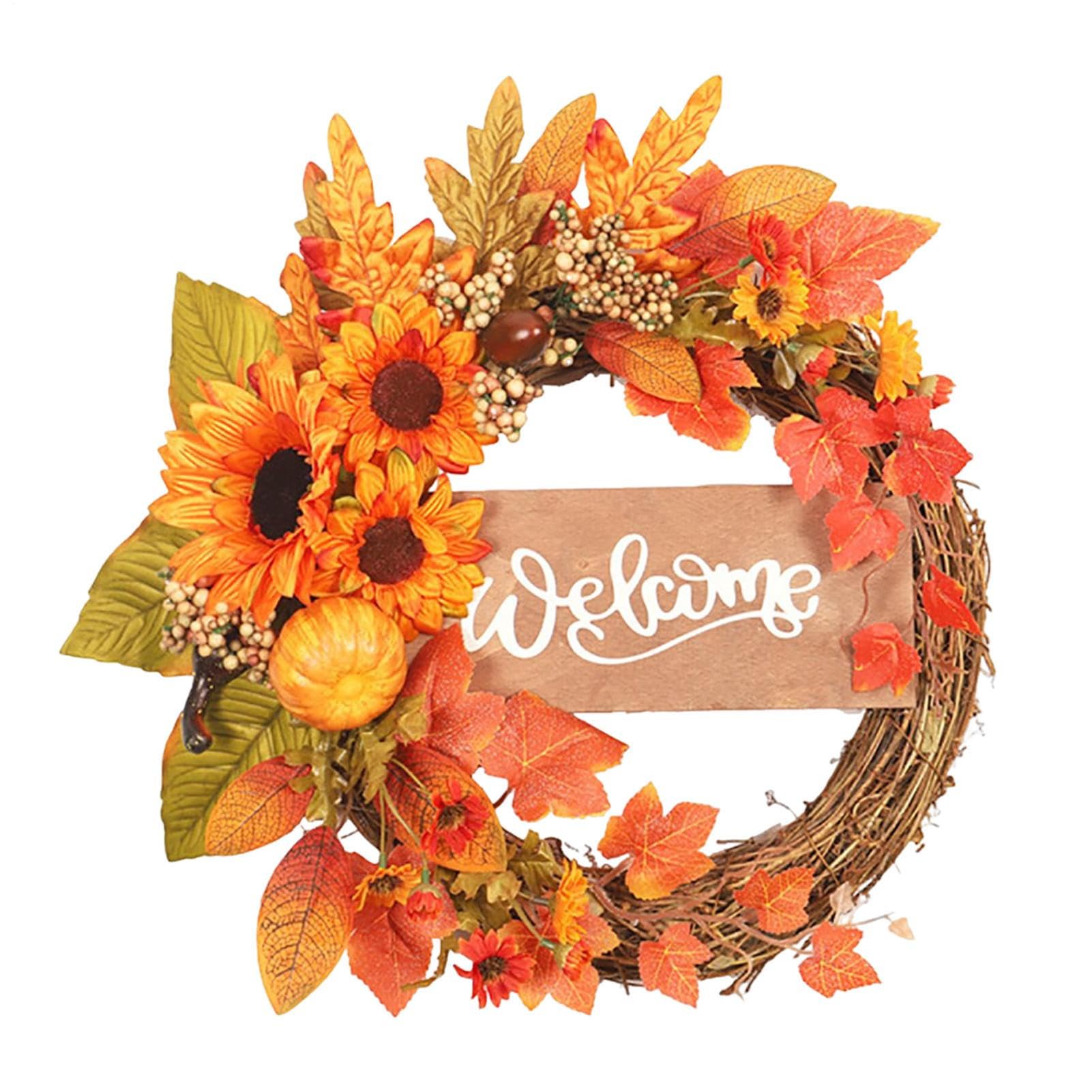 Couronne automnale pour Thanksgiving avec feuilles d'érable et citrouilles de décoration de table