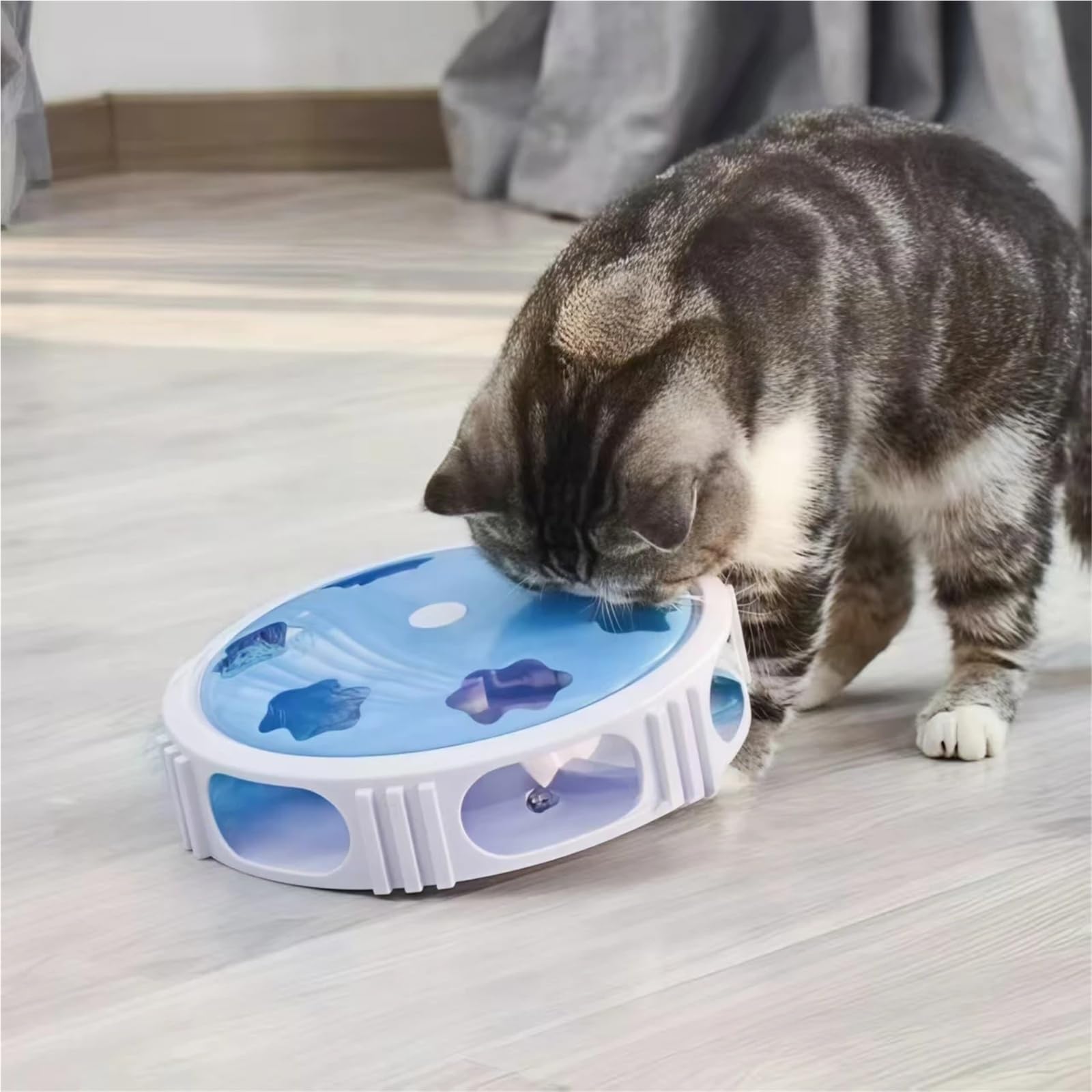 Katzen-Drehteller-Spielzeug mit Feder und LED-Licht, automatische Drehung, interaktives Katzenspielspielzeug (Rosa)