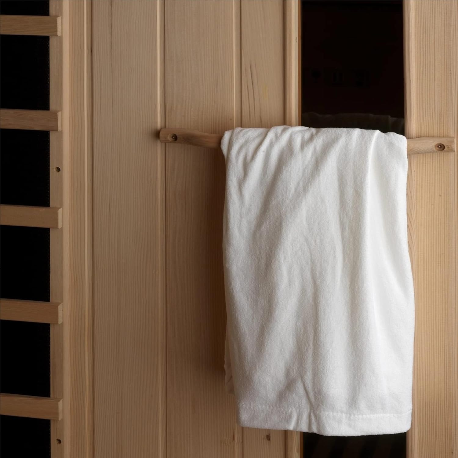 Interior towel rack with a towel