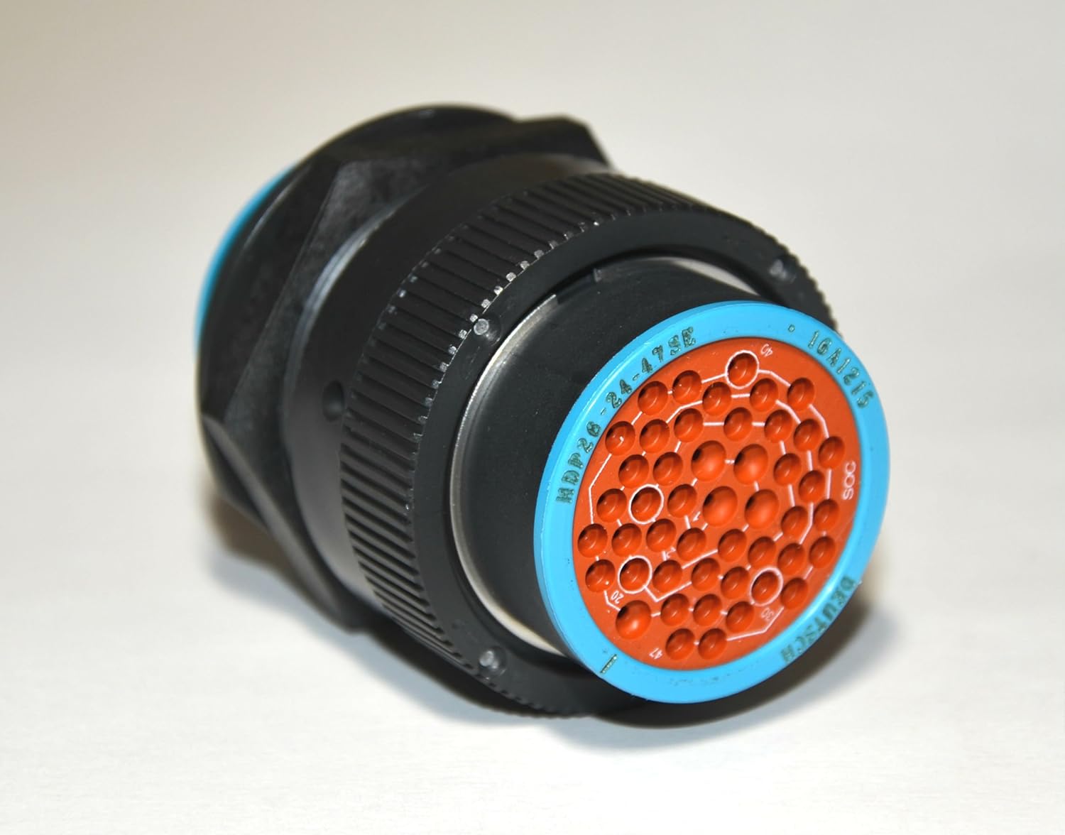 Close-up view of a Deutsch HDP20 47-pin male connector