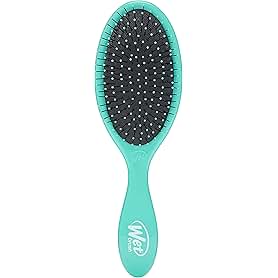Sponsored ad from Wet Brush. "Glide Through Tangles With Wet Brush." Shop Wet Brush.