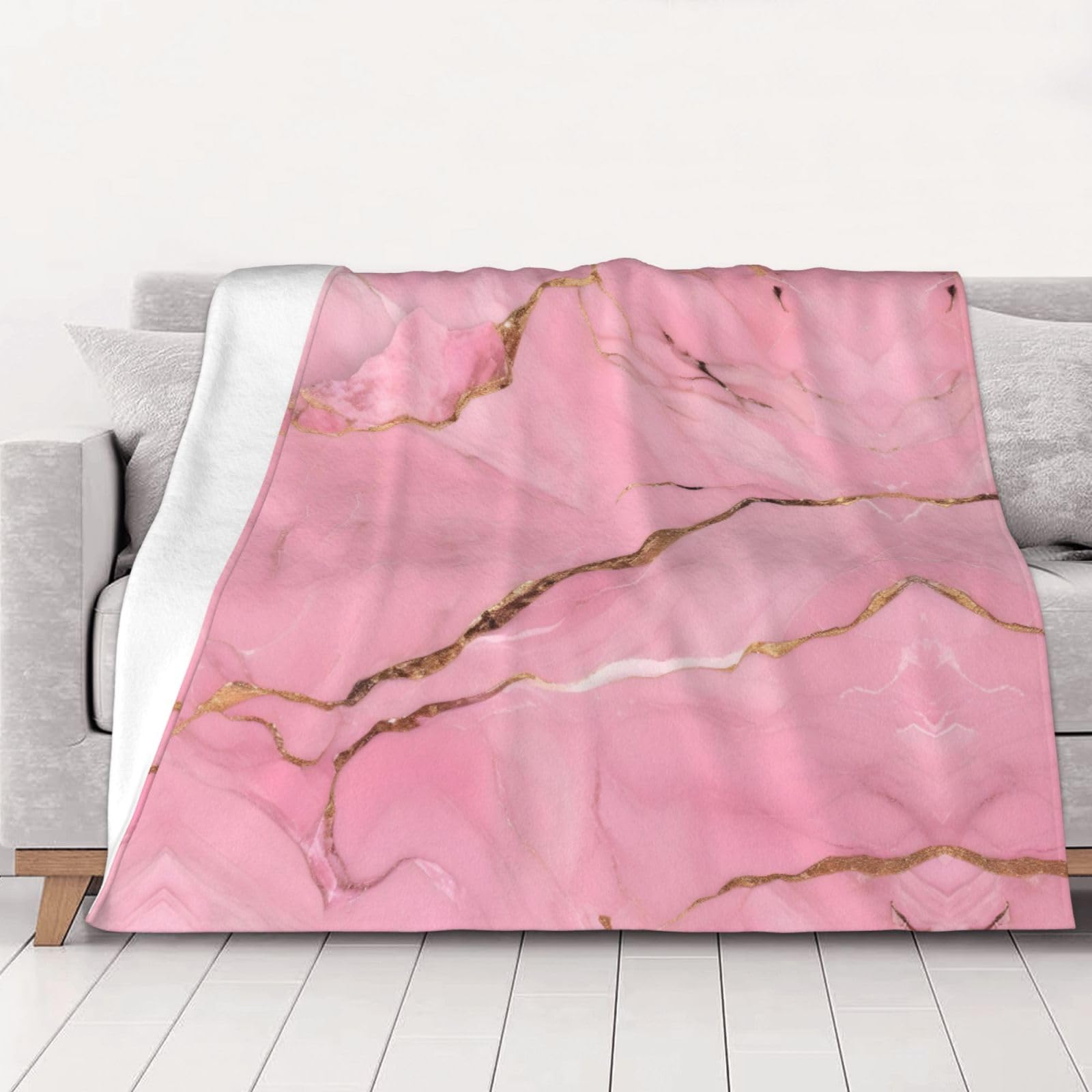 Couverture marbre rouge pour des soirées cocooning sur le canapé