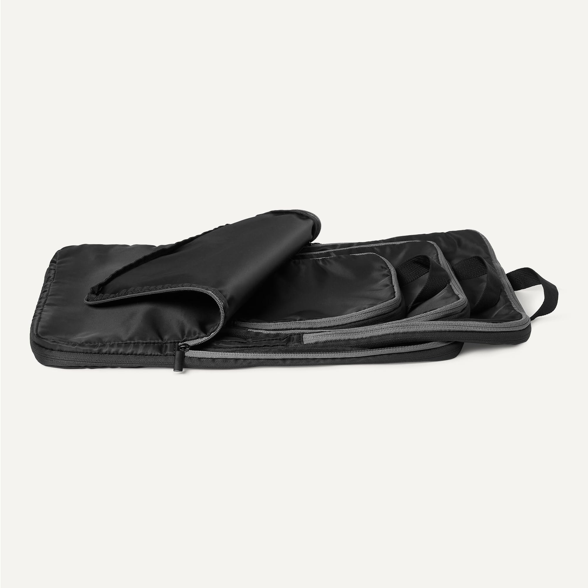 Amazon Essentials Cubi Organizer da Viaggio Ultraleggeri con Zip e Compressione, Confezione da 4, Nero