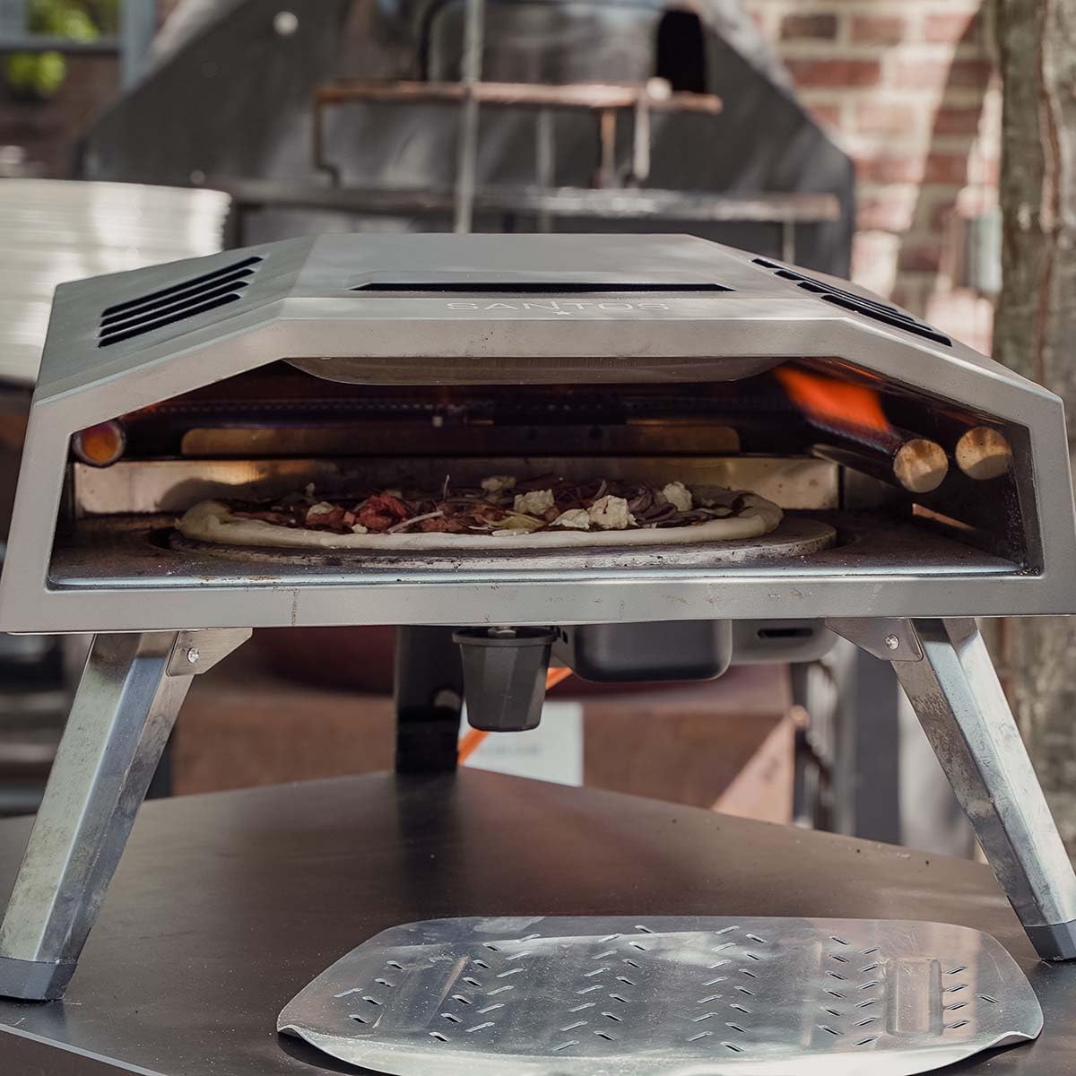 SANTOS Forno per pizza O-160 – con innovativo piatto girevole per pizza e bruciatore a U – pietra per pizza Ø 37 cm – doratura a 360° – forno per pizza a gas – inclusa copertura