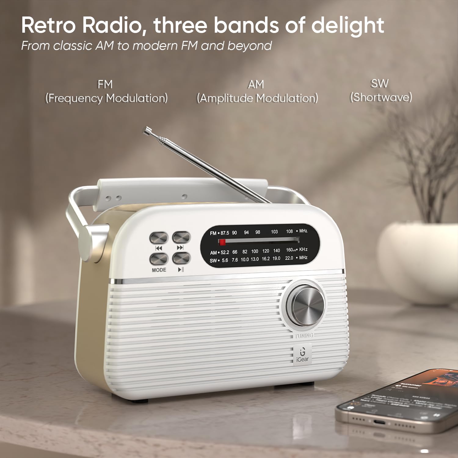 iGear Trinity radio with its antenna extended, showing the FM, AM, and SW frequency bands on the dial.