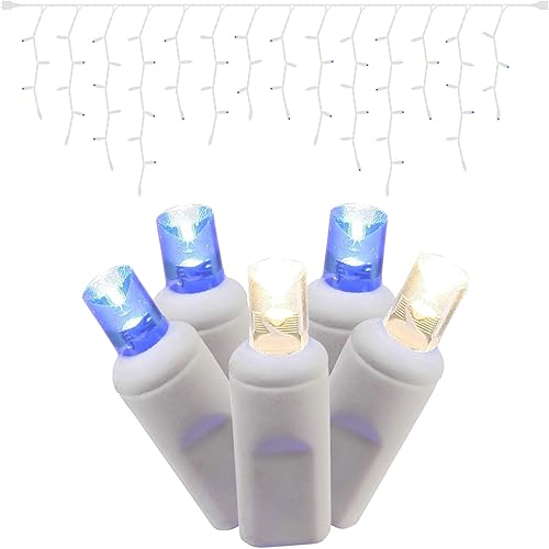 Vista 20 de Vickerman Juego de 70 luces LED de carámbano de gran angular azul claro y blanco cálido en cable blanco