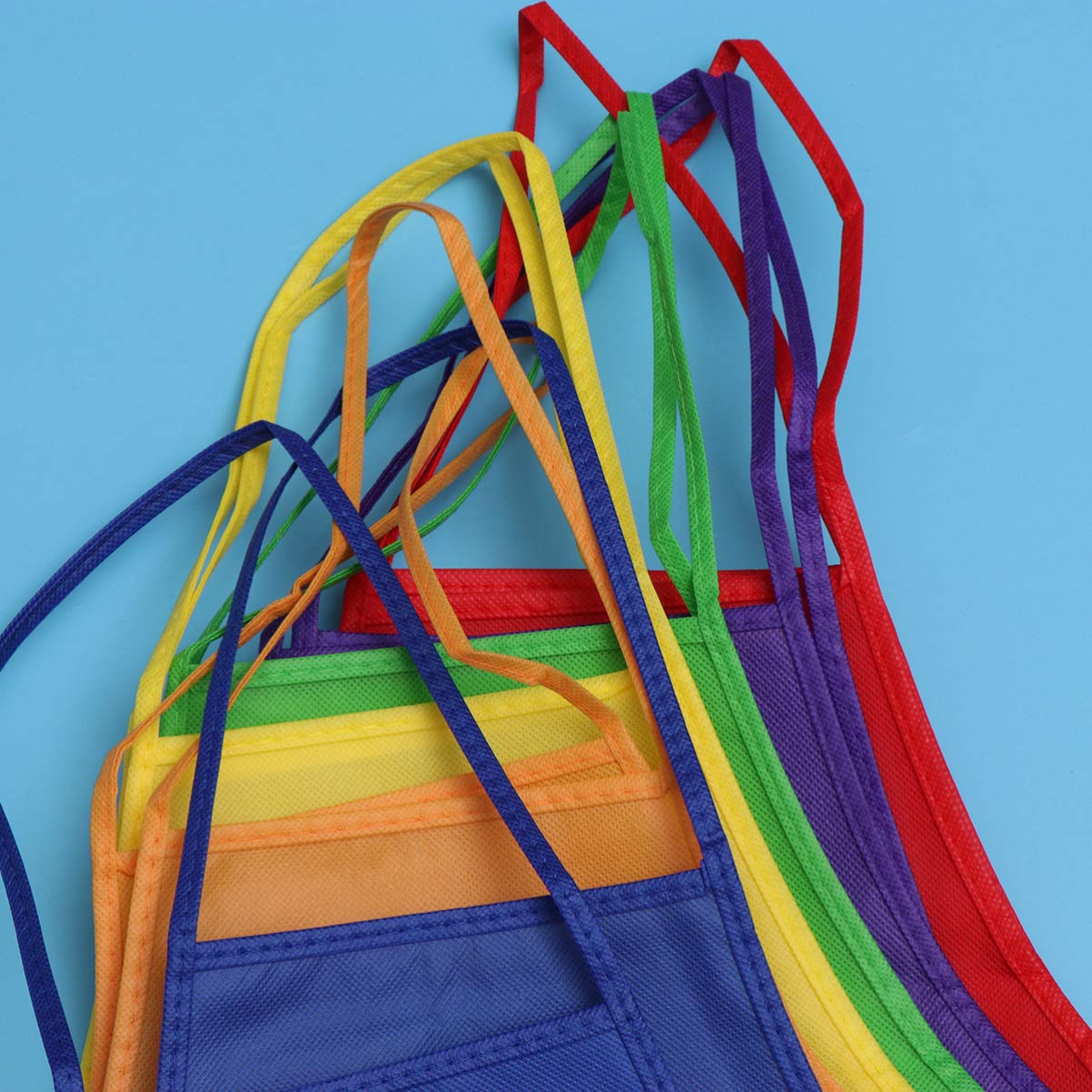 KOMBIUDA Grembiuli Non Tessuto per Pittura e Cucina Bambini Reutilizzabili Facili da Pulire 24pezzi Colore Casuale