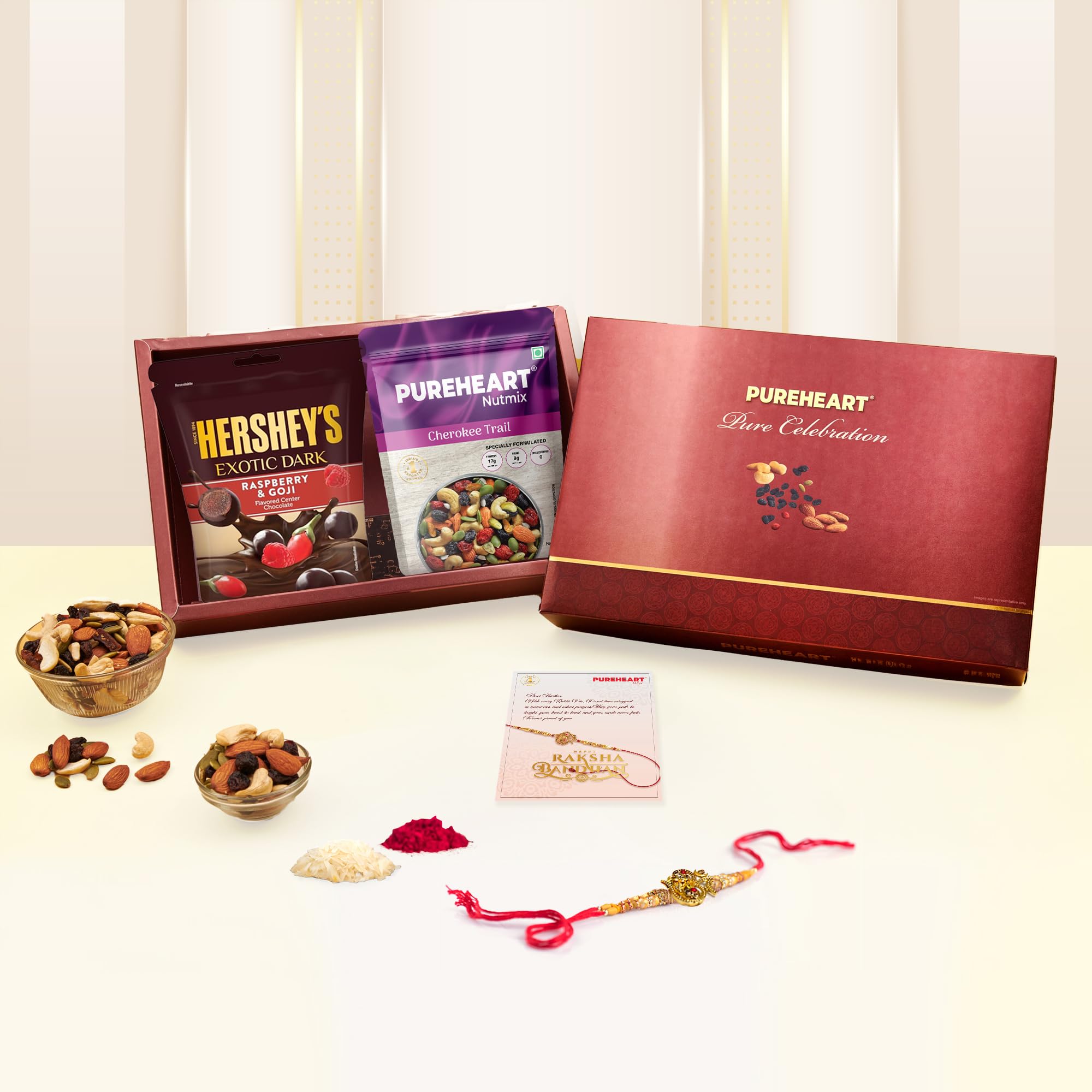 PUREHEART Rakhi Gift Hamper- Cherokee Trail Mix (80g) and Chocolates with Ganpati Rakhi for Brother, Gift Card, Pooja Rice, Kumkum - Crunchy Dry Fruits and Nuts