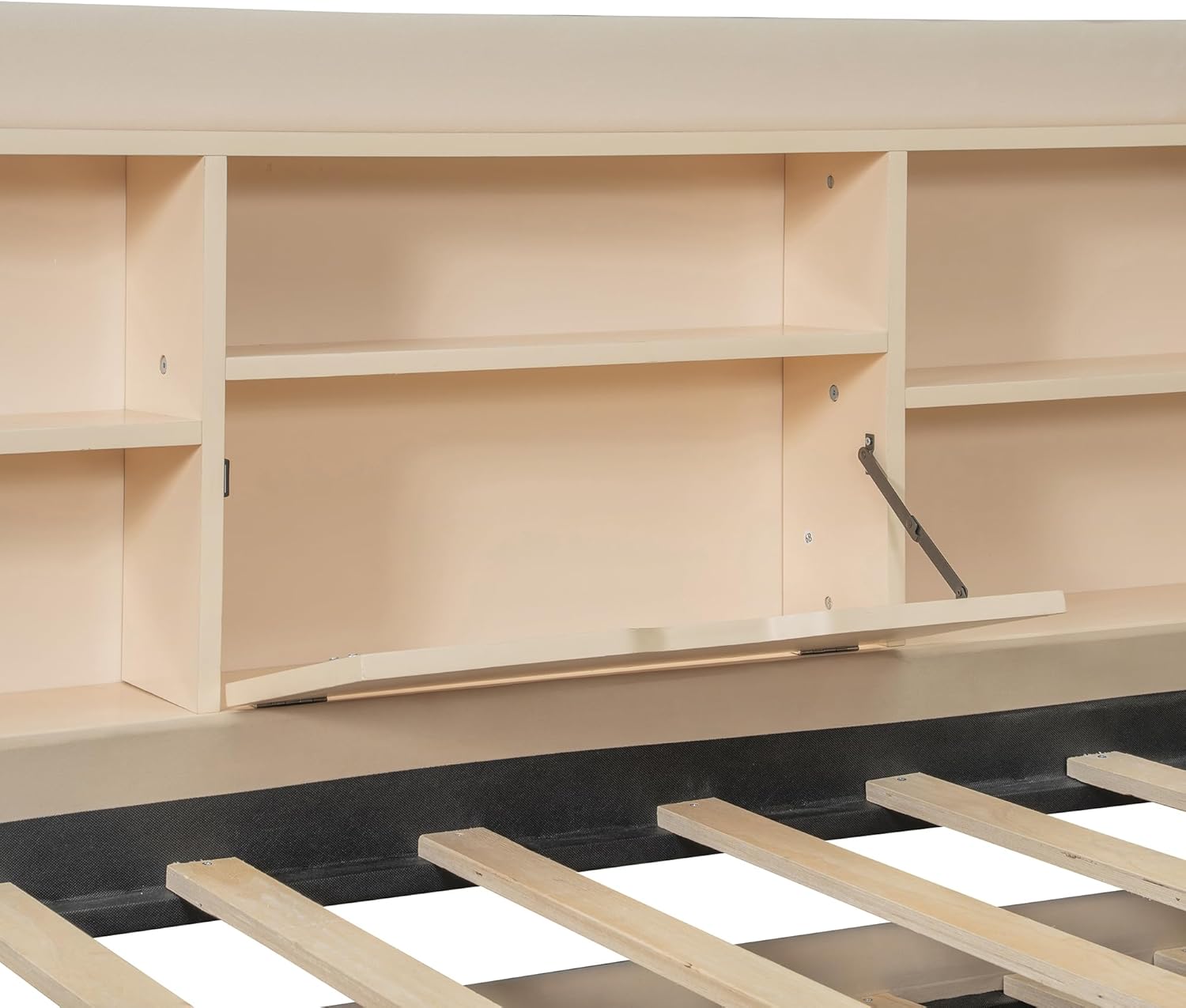 Close-up of the flip-top storage compartment within the headboard