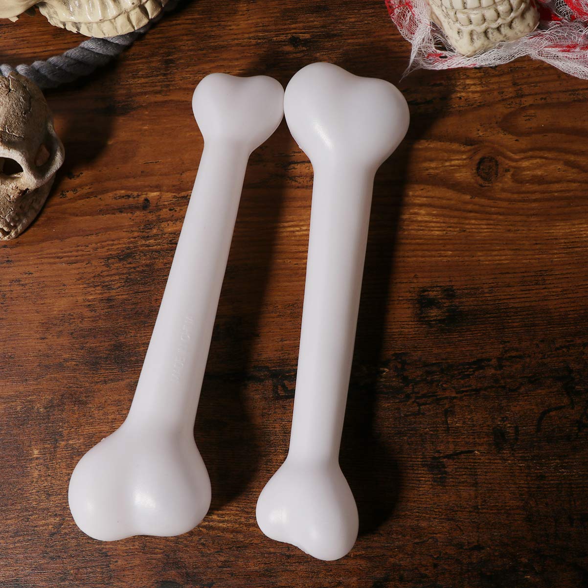Amosfun 2 Pcs Halloween Plastic Bones Simulation Savage Decorative Bones Spoof Props for Haunted House Halloween Party Bar Decoration 22cm (White)