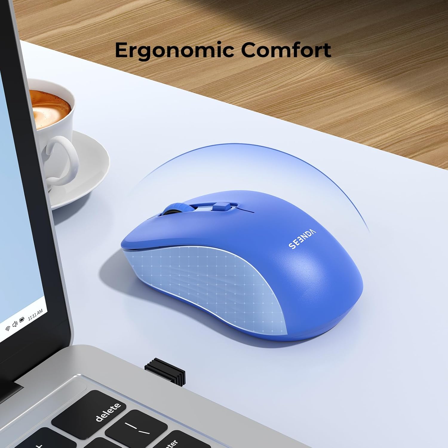 Ergonomic design of the seenda wireless mouse on a desk next to a laptop