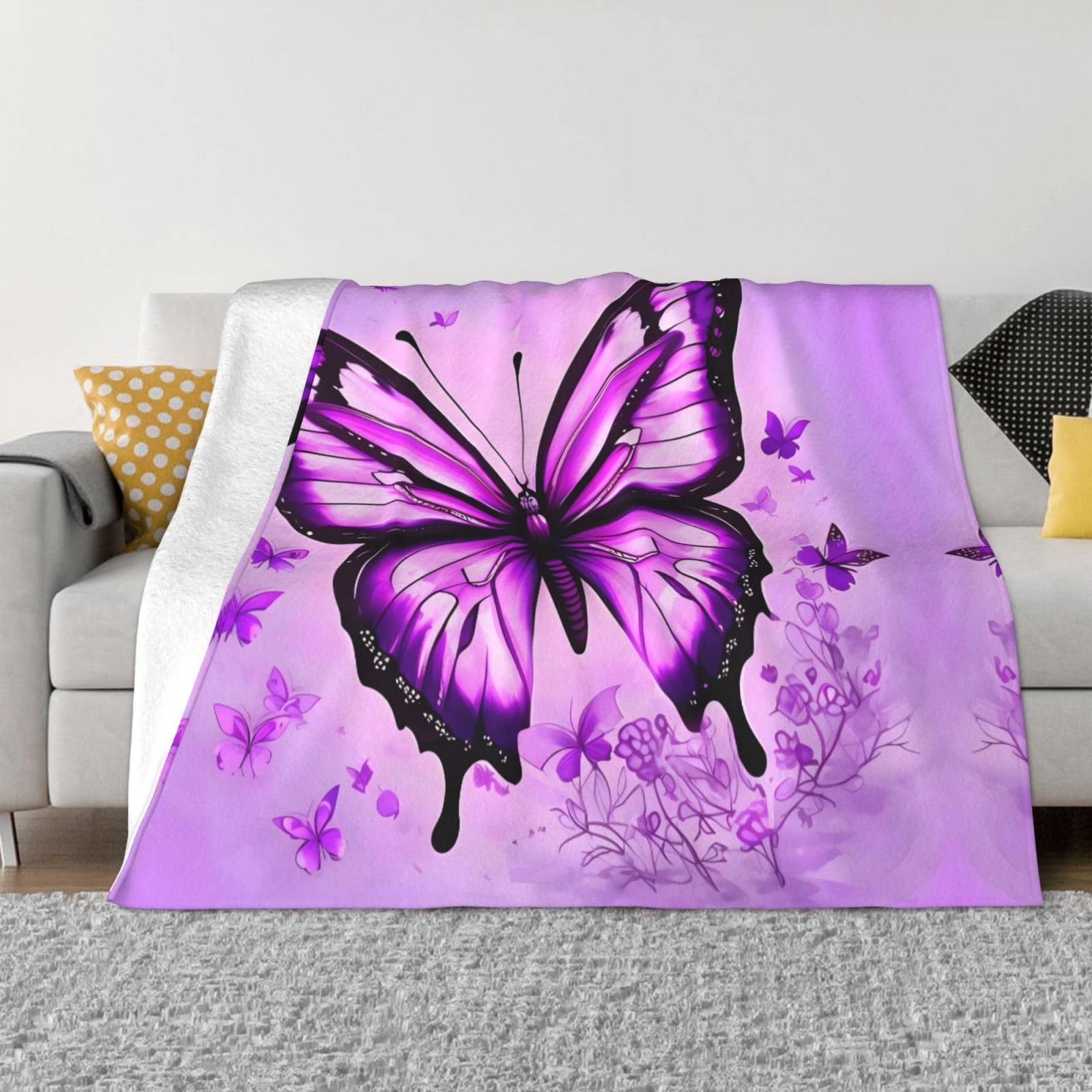 Couverture flanelle papillon violette contre le froid sur lit et canapé