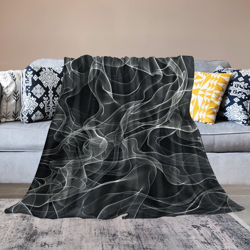Couverture flanelle lignes blanches pour cocooning sur canapé et lit