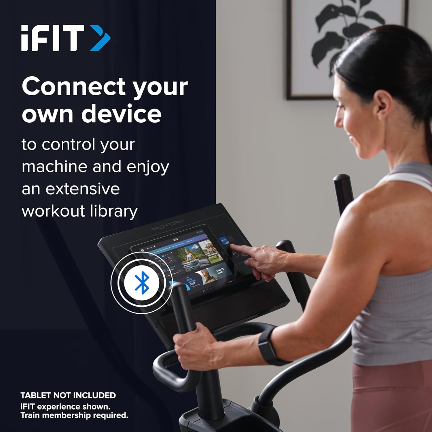 Woman connecting a tablet to the ProForm Sport Elliptical console, showing the iFIT interface on the tablet.