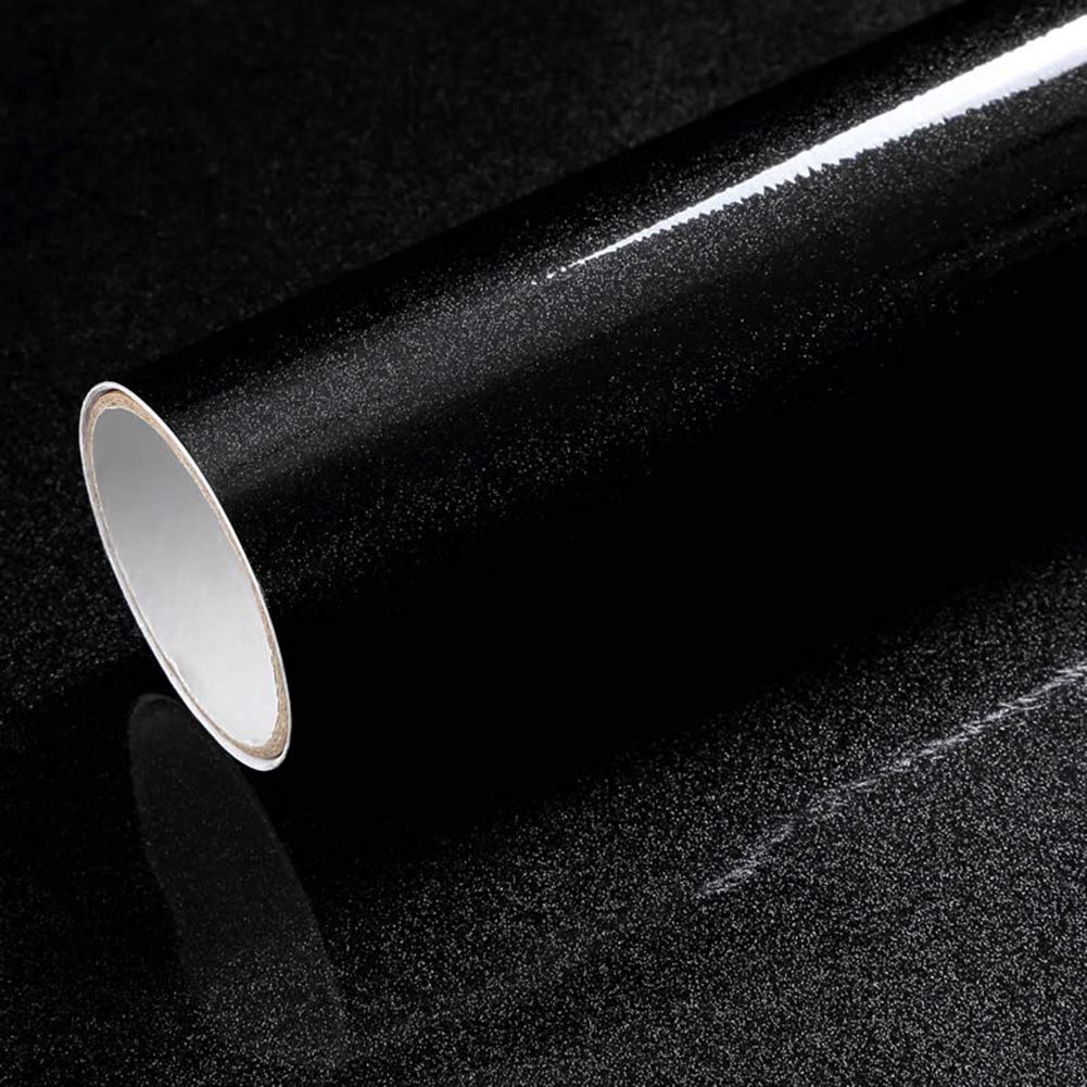 Papier peint noir brillant amovible pour relooker facilement des armoires abîmées