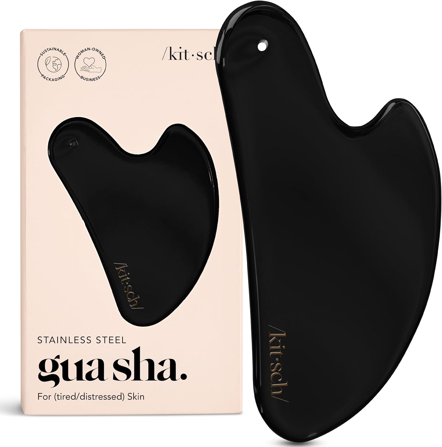 stainless steel gua sha matte black tool in hand