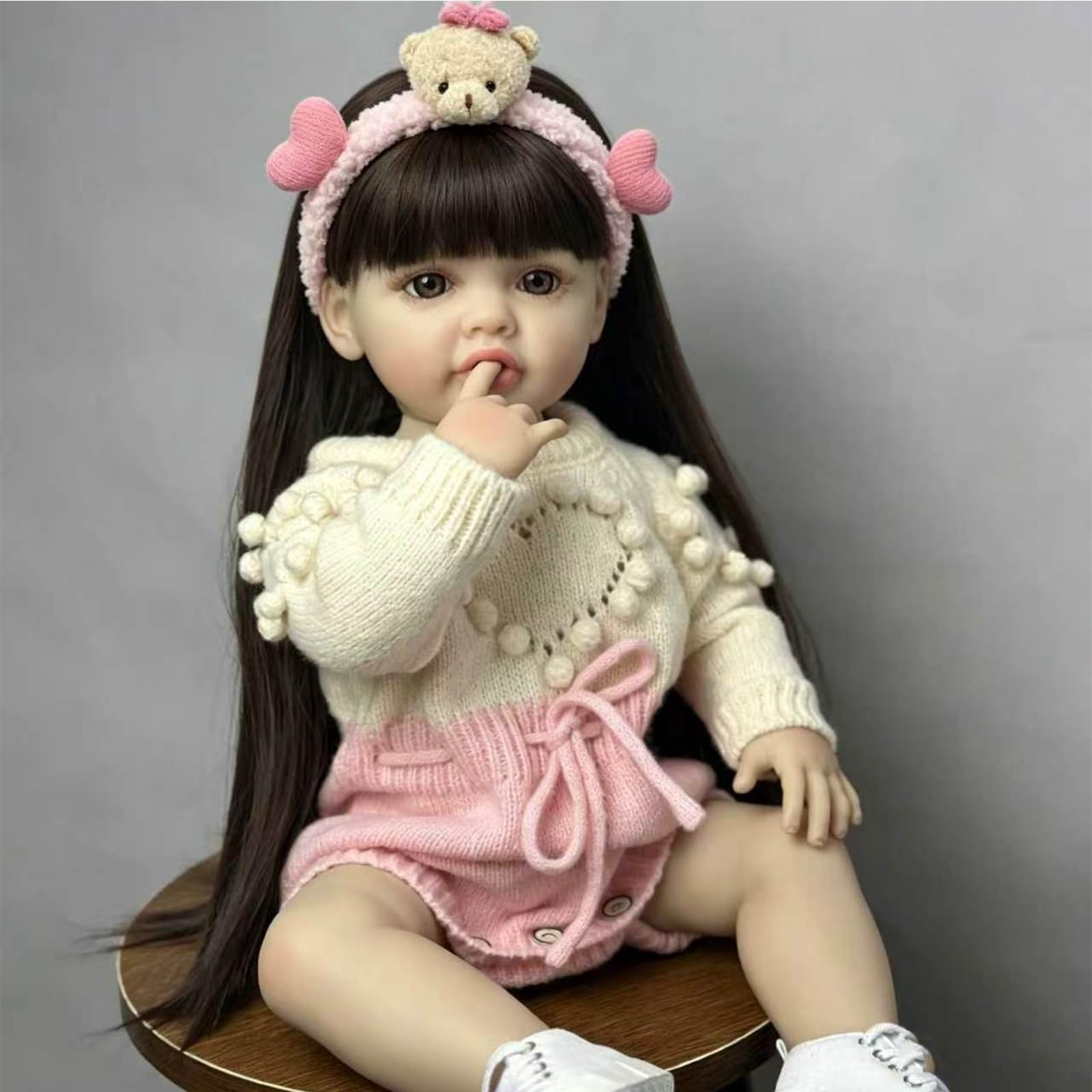 Reborn Lalka 55 cm Realistyczne Dziecko Miękki Silikonowy Winyl, Noworodek Dziewczyna Z Ruchomymi Stawami, Długie Brązowe Włosy, Różowy Strój Z Akcesoriami