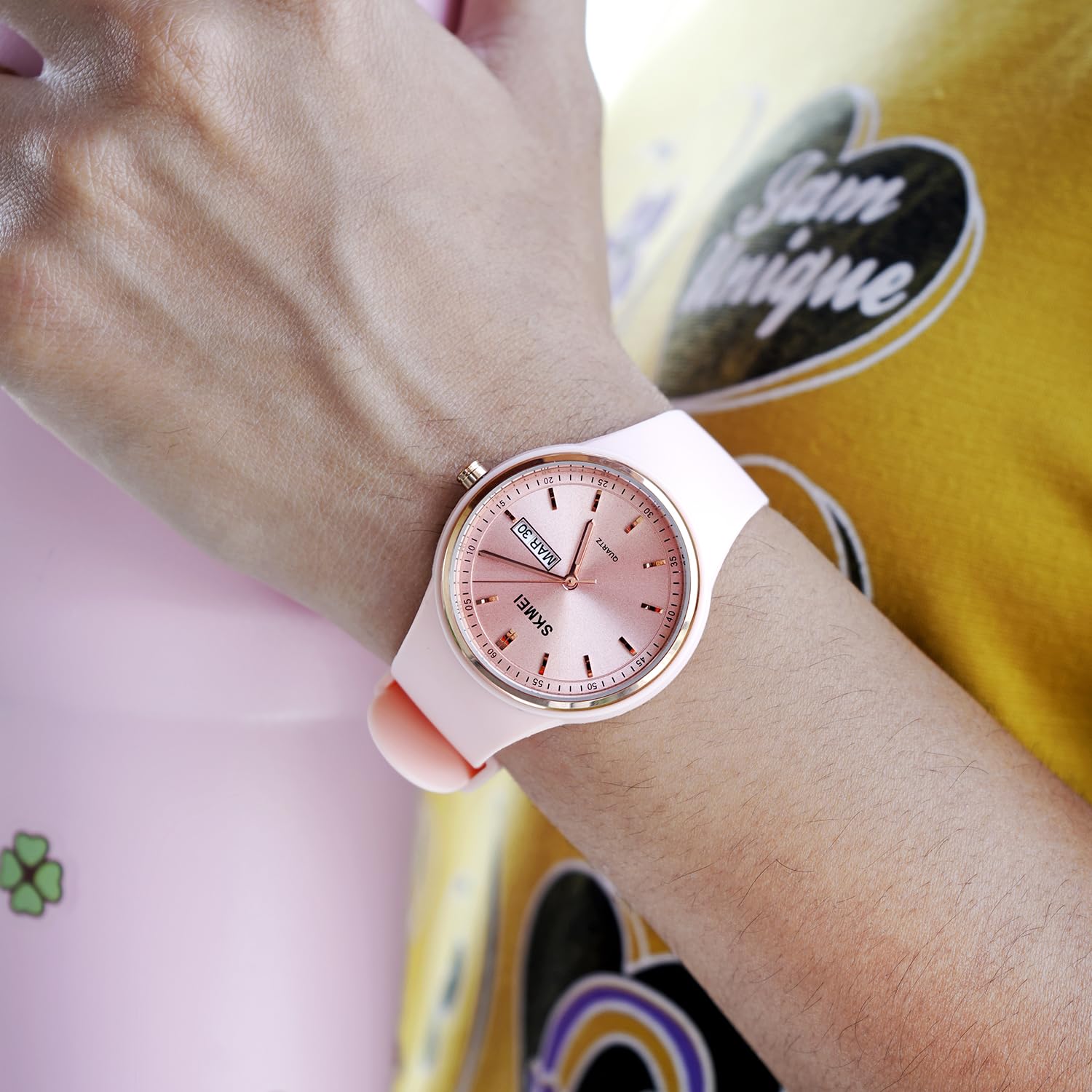 SKMEI Model 2057 watch worn on a wrist, showing the silica gel band and buckle clasp.
