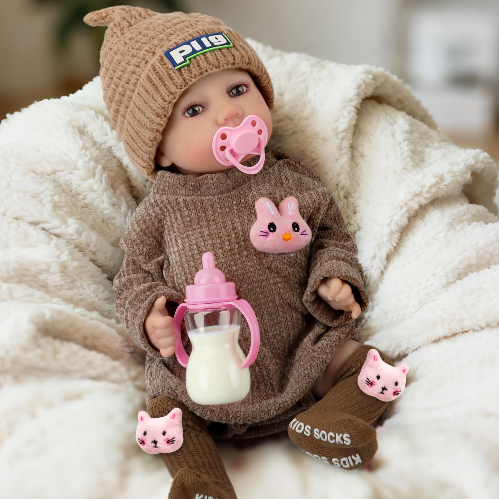 JONRRYIN Bambole Reborn con Sensore di Gravità, 43cm Bambole Reborn Interattive per Bambine, che Respirano, Piangono e Ridono, Ideali dai 3 Anni in su (Marrone)