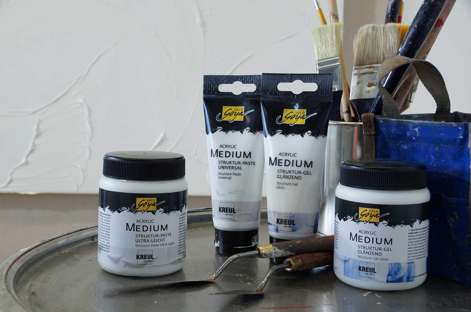 KREUL 85610 - Solo 1000 ml Goya Acrylic Medium w kolorze białym, struktura pasty gruboziarnisty piasek, pastelowa szpachla, o gruboziarnistej strukturze powierzchni, może być barwiona i malowana