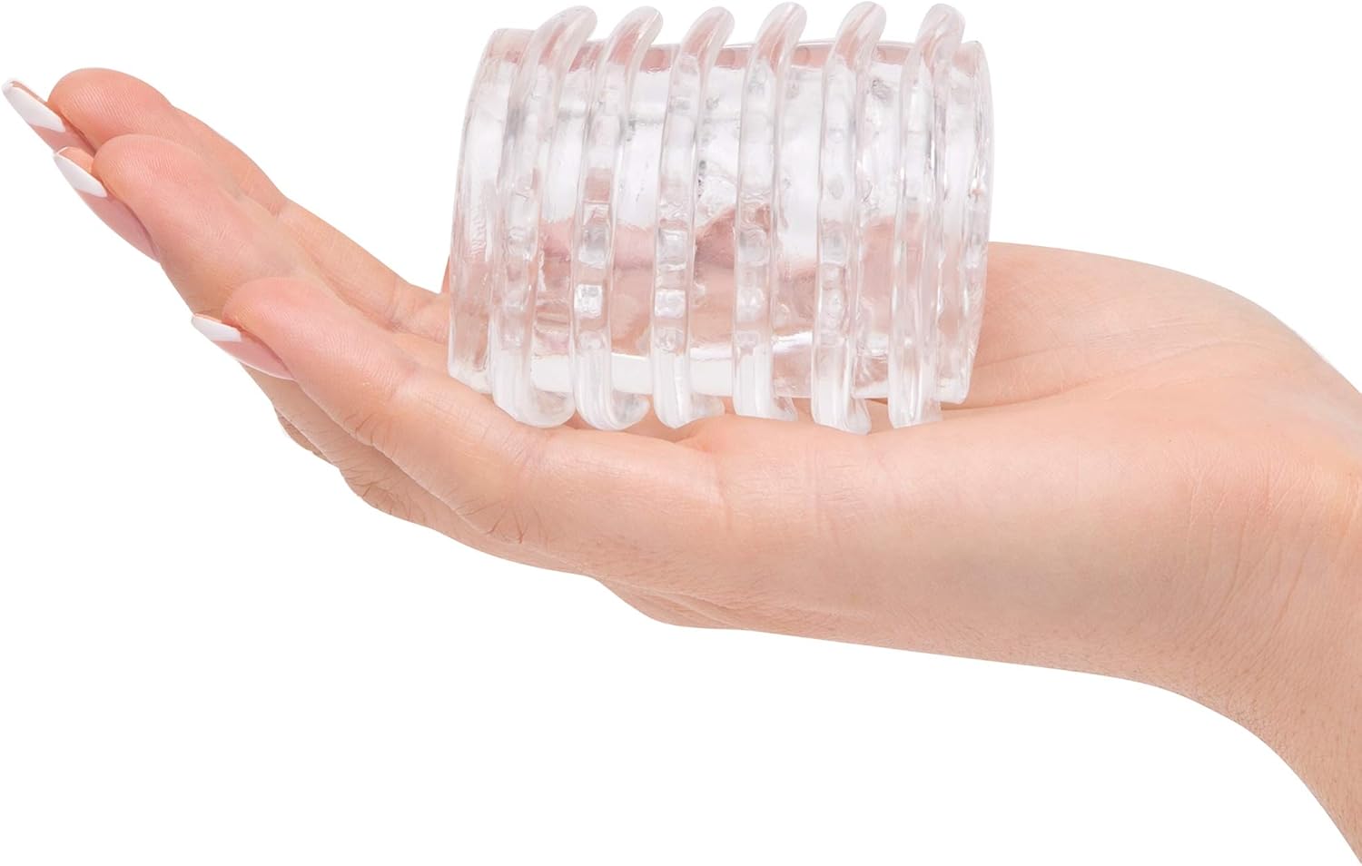 Lovehoney Head Master stroker held in a hand for scale