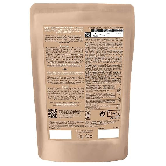 Valrhona Premium French Baking Milk And Hazelnut Chocolate Discs (Feves). AZELIA 35% Cacao. Easy Melt. Easy to chop. Creamy and Balanced. Superb in sauces and frostings. 250g (Pack of 1)