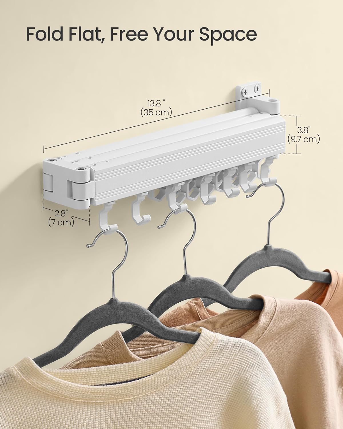 The wall-mounted drying rack folded flat against the wall, showing its compact profile i dimenzije.