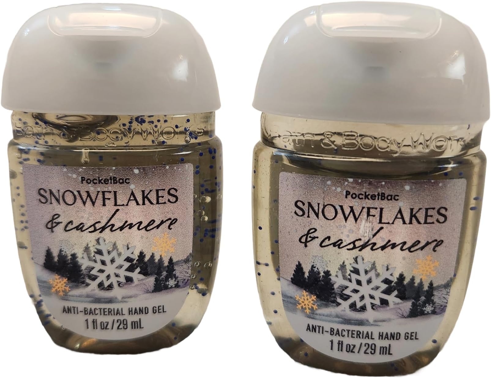 Bath and Body Care - Travel Size Sanitizer - 2 piece Bundle Set Hand Gel - 1 Fl Oz each - Label Artwork Varies (SNOWFLAKES & CASHMERE)