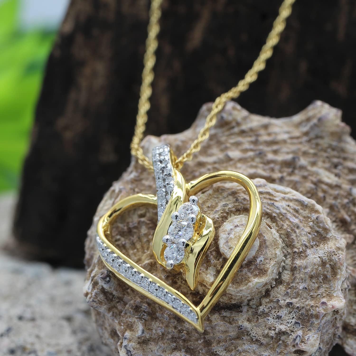 SAVEARTH DIAMONDS 1/4 Carat Round Cut Lab Created Moissanite Diamond 3-Stone Heart Pendant Necklace In 14k Gold Plated 925 Sterling Silver With 18" Chain (VVS1 Clarity, 0.25 Cttw)