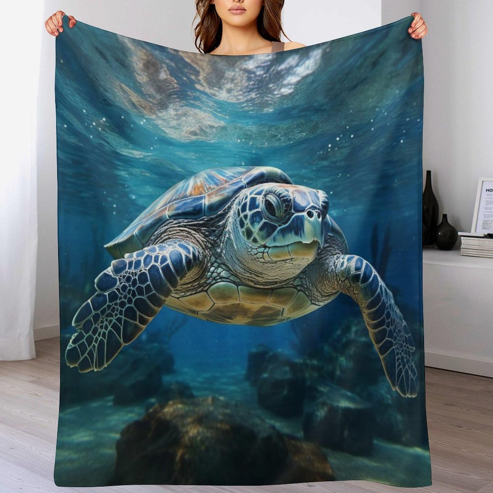 Couverture polaire motif tortue pour réchauffer vos soirées canapé