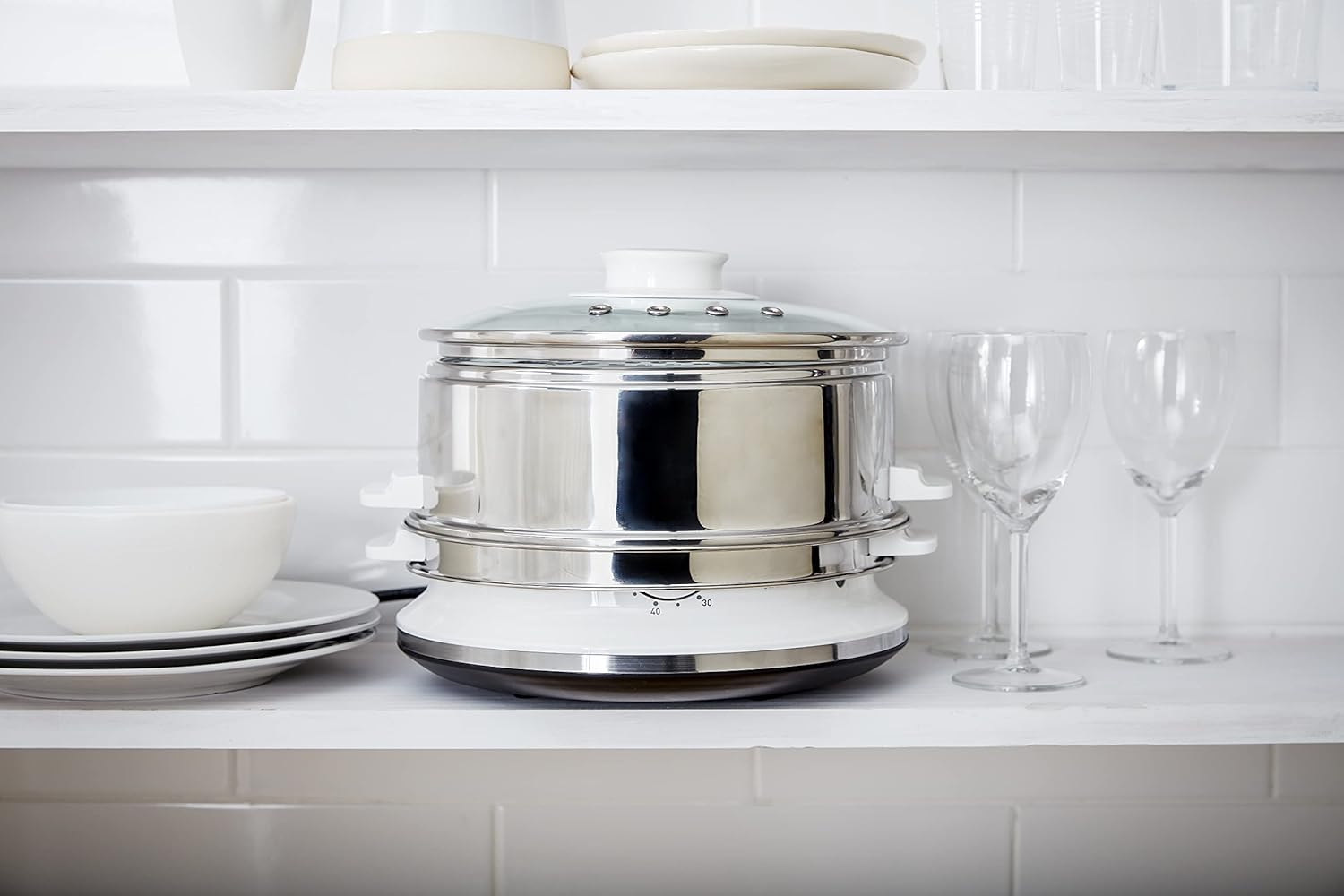 Tefal VC145140 Steam Cooker stored compactly on a kitchen shelf.