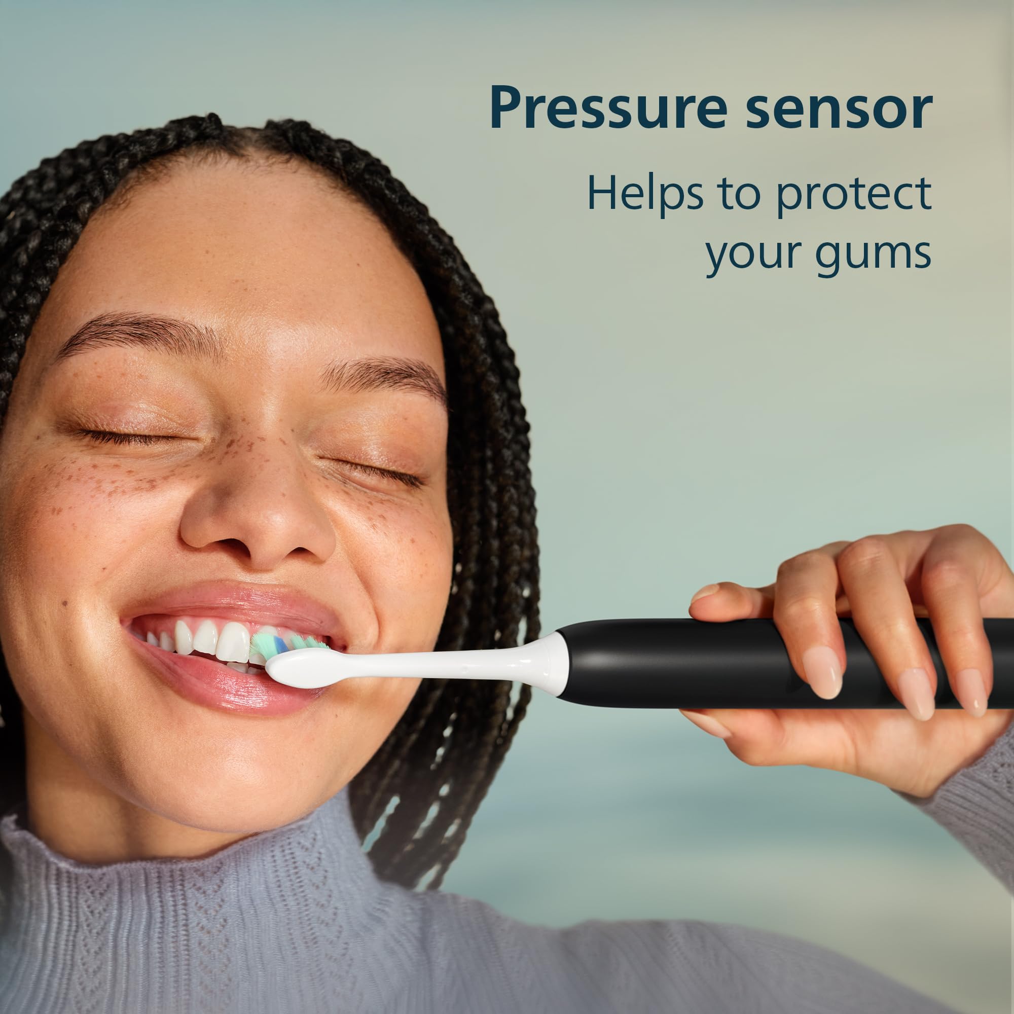 Philips Sonicare Spazzolino elettrico serie 4100, spazzolino sonico con sensore di pressione, 3 livelli di intensità, funzione EasyStart, SmarTimer e QuadPacer, autonomia di 14 giorni, nero, modello