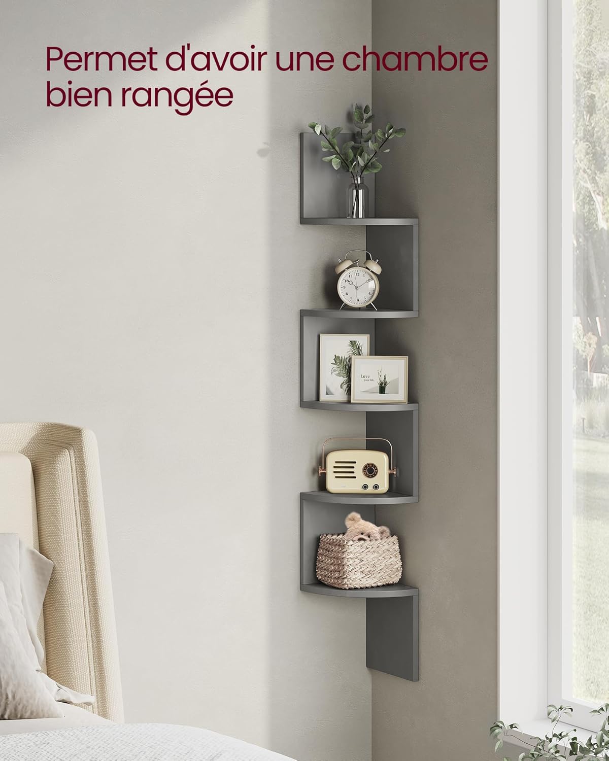 VASAGLE corner shelf in a bedroom, holding an alarm clock, framed photos, and a radio.