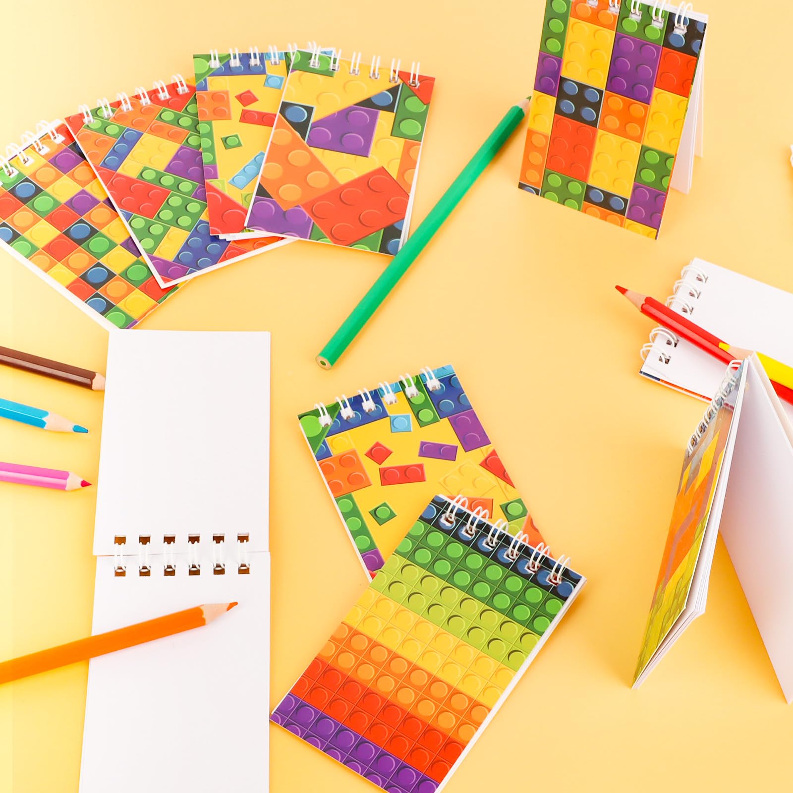 Atiloy Paquete de 24 mini cuadernos de bloques de construcción a granel, coloridos blocs de notas en espiral para niños, suministros de fiesta temática de carnaval, decoración para adolescentes, niñas