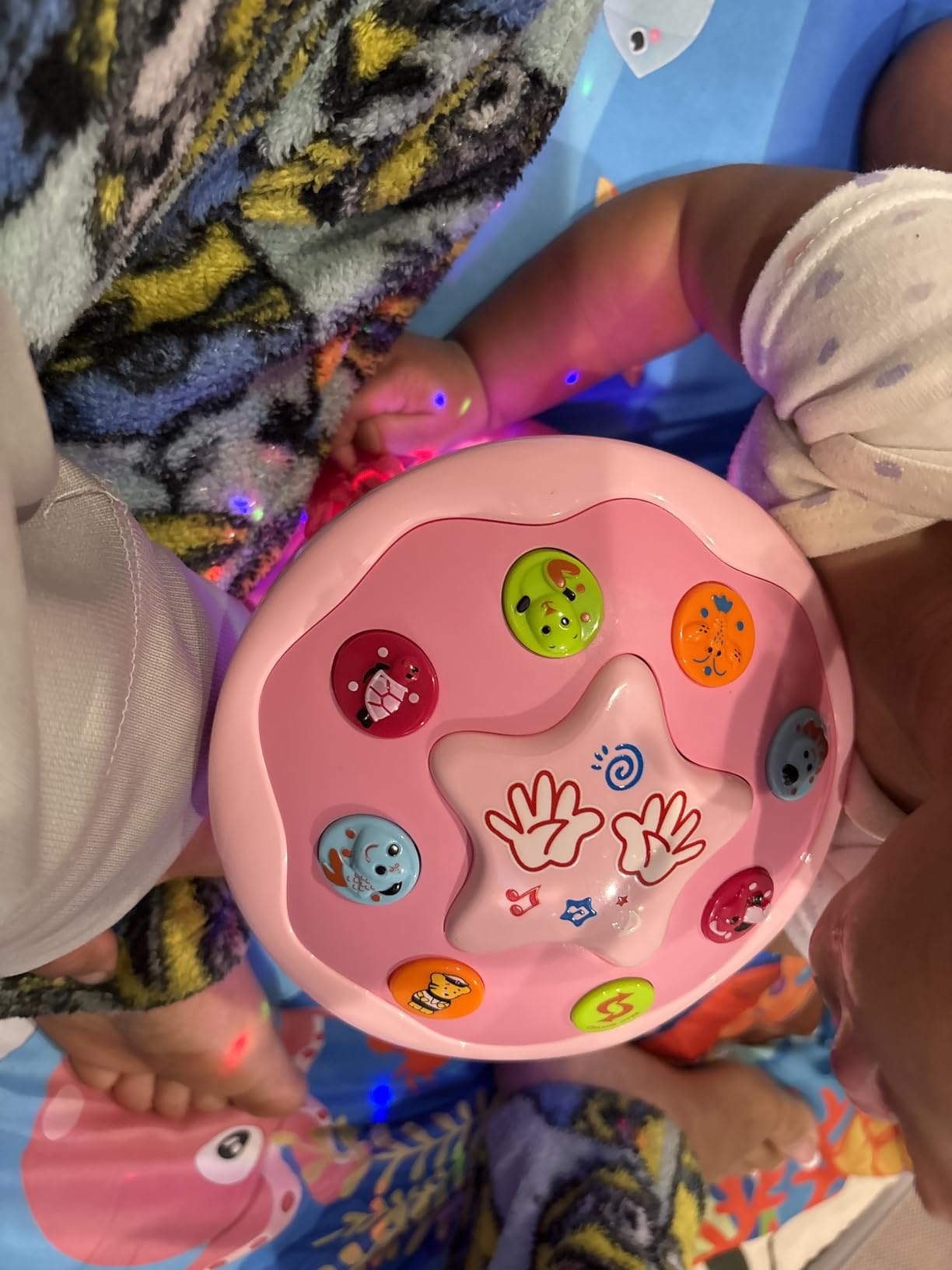 Genuine customer child playing with the LumaNest sensory toy