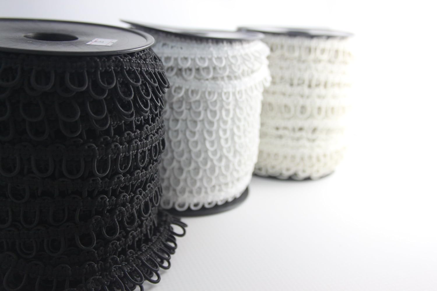 Nakpunar 12" White Elastic Button Loops - Adjacent