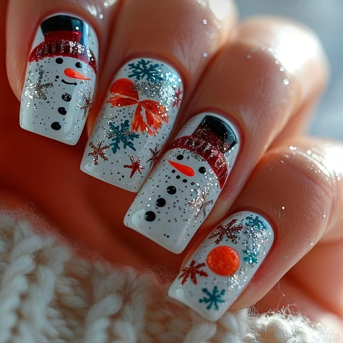 Photo 1 of Christmas Press on Nails Medium Square Fake Nails with Snowflake Designs Full Cover Winter Xmas Cute Snowman Acrylic Stick on Nail White False Nails for Women Holidy Manicure Art 24 PCS