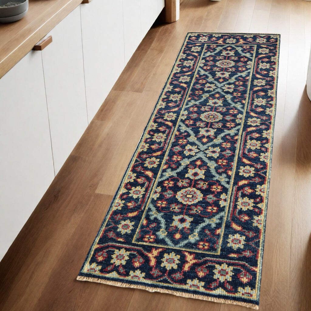 HomeRoots 511638 8 x 10 ft. Blue Green & Red Wool Floral Hand Knotted Distressed Stain Resistant Rectangle Area Rug with Fringe