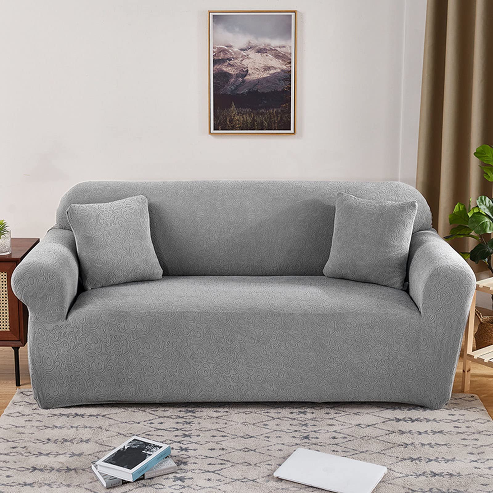 Housse de canapé jacquard gris pour protéger le salon des animaux