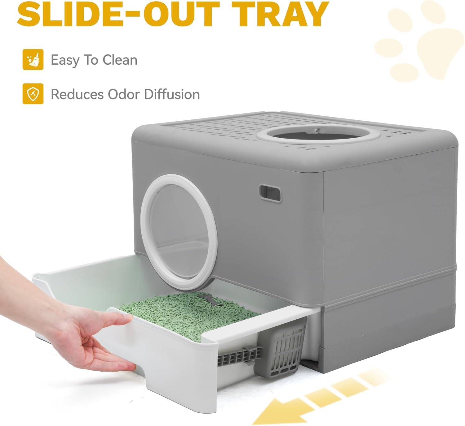 Hand pulling out the slide-out litter tray for cleaning