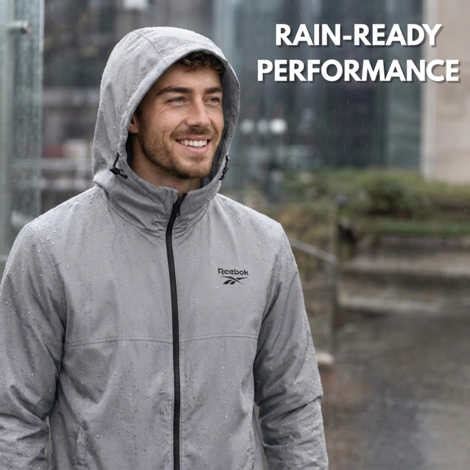 Reebok Chaqueta impermeable para hombre con capucha, cortavientos para hombre, ligera e impermeable