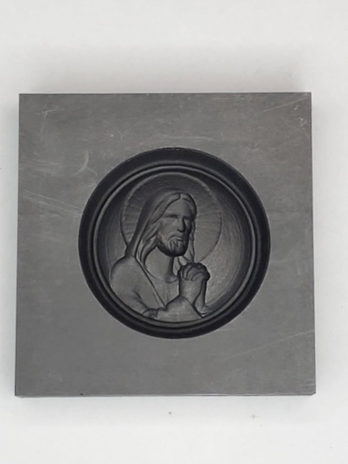 Graphite Mold Jesus II This Mold is Ideal for Casting a 3D Image. Works Great with Gold, Silver, Copper, Aluminum, Tin, and Other Precious and Non-Precious Metals. As Well as Pressing Glass. Ingot