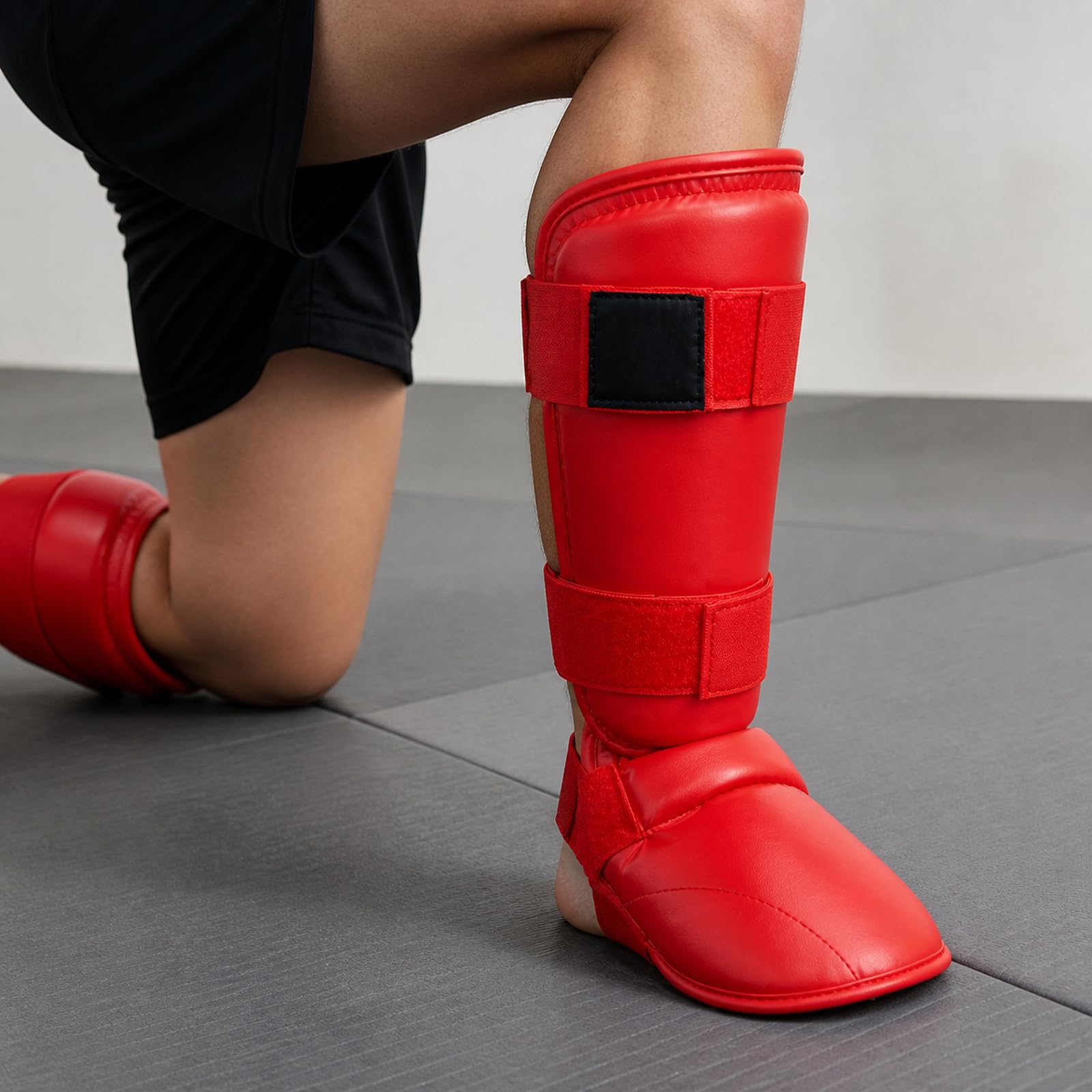 Piedi Protezione Shin Guard,Parastinchi per Arti Marziali,Boxing Parastinchi Uomo e Donna,Regolabili,Traspirante,per Boxe,Muay Thai,Sport da Combattimento e Allenamento Quotidiano
