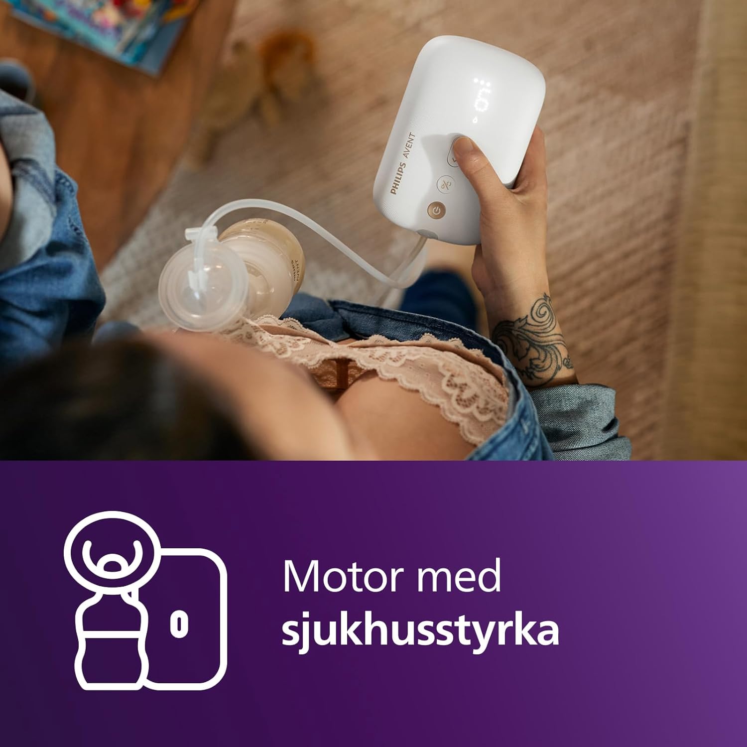 Woman holding disassembled breast pump parts for cleaning