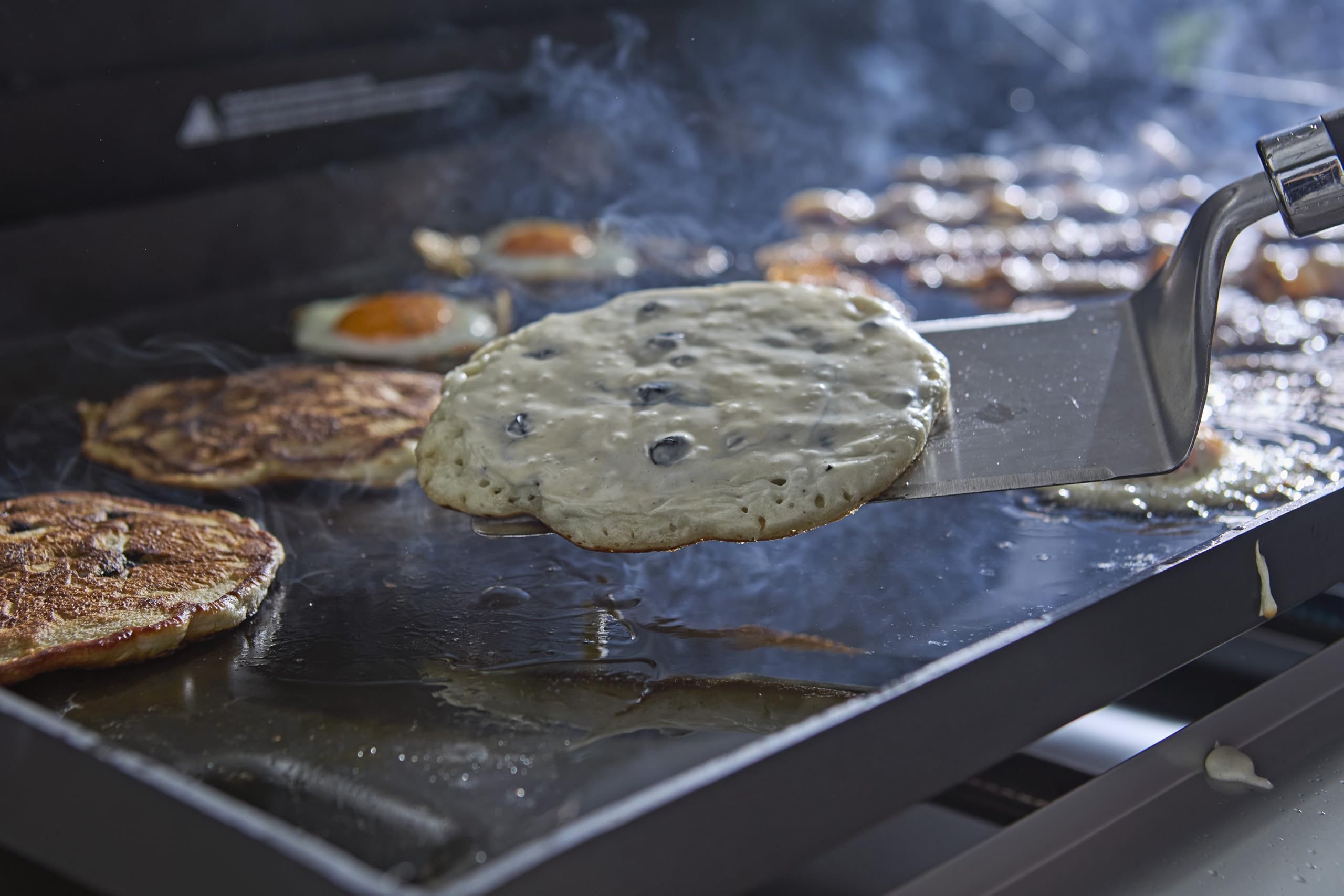 Weber Zestaw łopatek do płyt grillowych – Planchas, 2-częściowy, ze stali nierdzewnej, ze ściętą krawędzią przednią do łatwego przesuwania pod grillowanymi potrawami, kolor srebrny – czarny (3400424)
