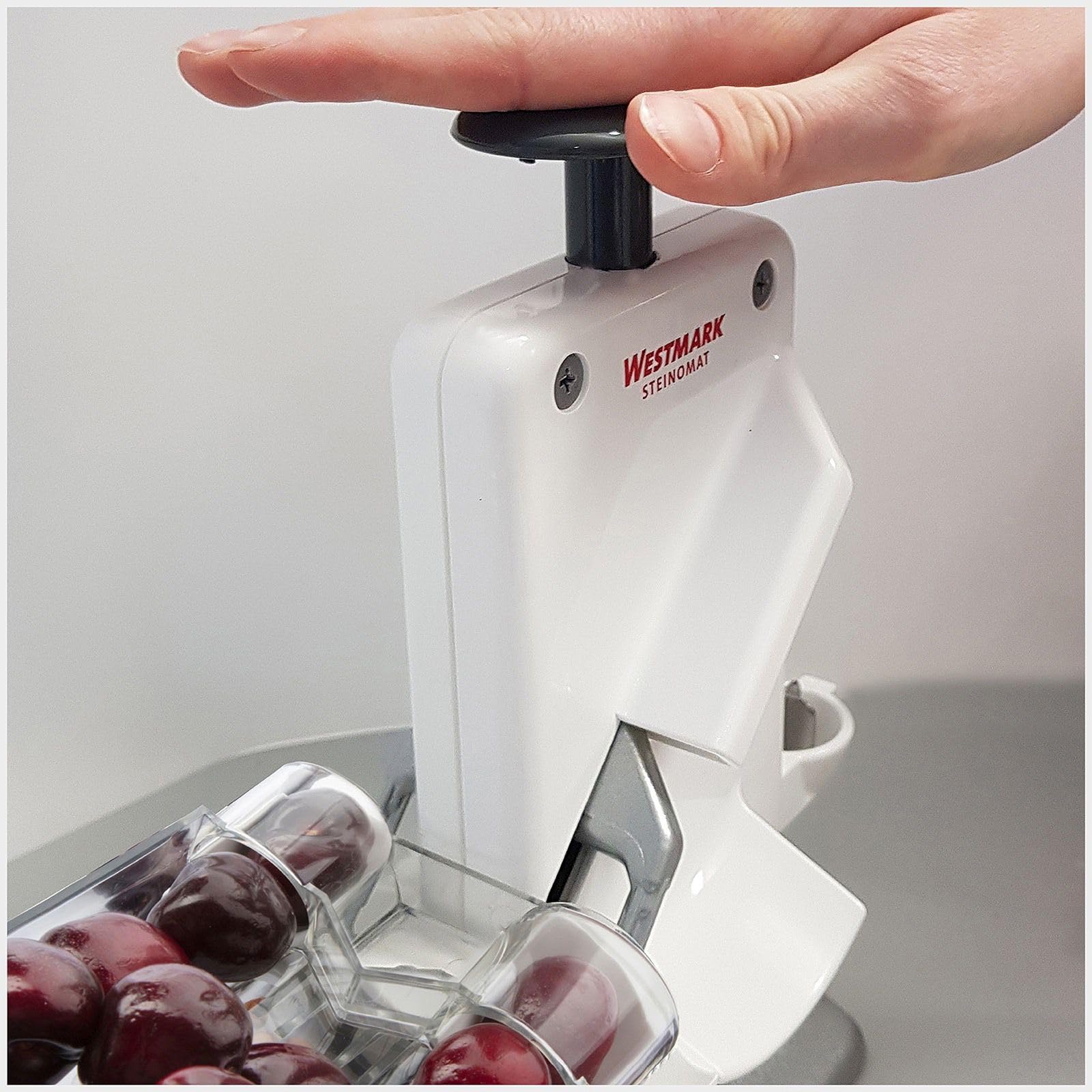 Westmark Deshuesador doble de cerezas y ciruelas, Deshuesador combinado, Extra rápido: para 2 cerezas a la vez, Altura: 32,5 cm, Plástico / acero inoxidable / aluminio, Steinomat, Blanco / plateado, 40602260